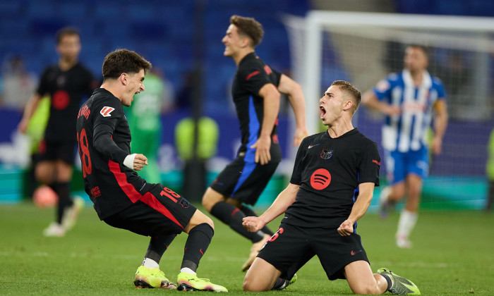 Pau Victor of FC Barcelona with Fermin Lopez of FC Barcelona celebrate the team's victory and confirmation of winning the LaLiga title after the LaLig