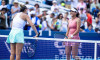 MASON, OHIO - AUGUST 11: Aryna Sabalenka meets at net with Emma Raducanu of Romania during Day 5 of the Cincinnati Open at the Lindner Family Tennis Center on August 11, 2025 in Mason, Ohio. (Photo by Mauricio Paiz)