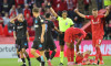 FCSB Juri Cisotti fouls Aberdeen's Nicolas Milanovic to receive a red card and be sent off during the UEFA Europa League play-off match at Pittodrie Stadium, Aberdeen. Picture date: Thursday August 21, 2025.