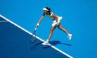 MASON, OHIO - AUGUST 13: Sorana Cirstea of Romania serves against Iga Swiatek of Poland during Day 7 of the Cincinnati Open at the Lindner Family Tennis Center on August 13, 2025 in Mason, Ohio. (Photo by Mauricio Paiz)