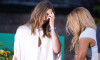 Newport, RI. August 23, 2025. Maria Sharapova and Serena Williams share a laugh after Sharapova was inducted into the International Tennis Hall of Fame. @ Veronica Bruno / Alamy Live News