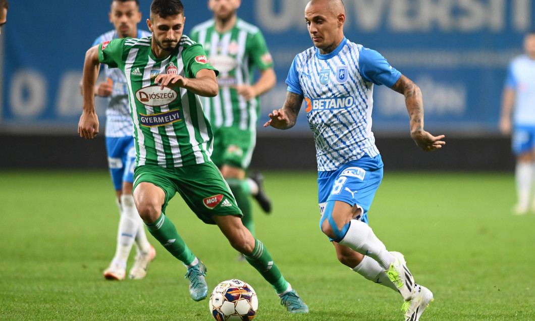 Nicolae Ionut Paun si Ionut Alexandru Mitrita in meciul de fotbal dintre Universitatea Craiova si Sepsi OSK Sfantu Gheor