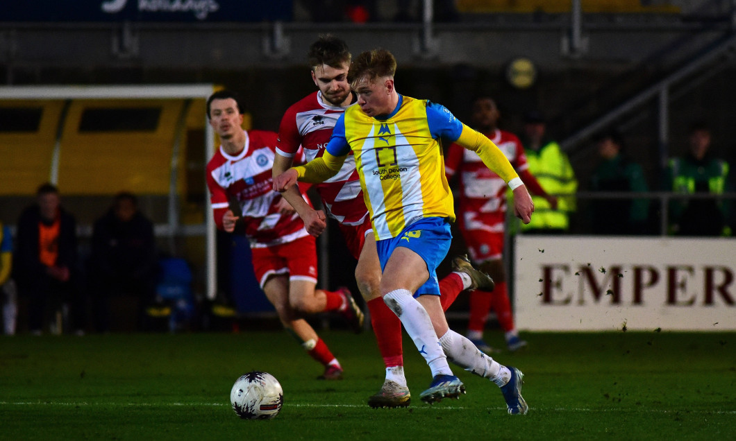 Torquay United v Eastbourne Borough, Torquay, UK - 6 Jan 2024 Will Jenkins Davies of Torquay United challenges for the b