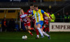 Torquay United v Eastbourne Borough, Torquay, UK - 6 Jan 2024 Will Jenkins Davies of Torquay United challenges for the b