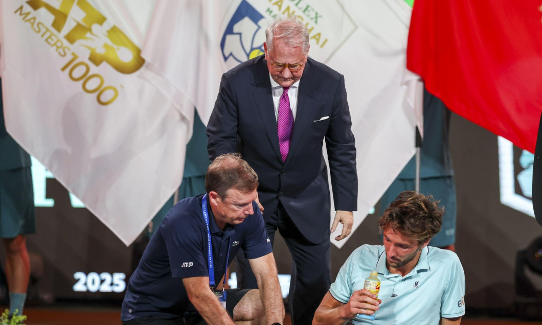 SHANGHAI, CHINA - OCTOBER 12: Arthur Rinderknech of France feels unwell during the award ceremony after his match against Valentin Vacherot of Monaco on day 14 of the 2025 Shanghai Rolex Masters at Qi Zhong Tennis Center on October 12, 2025 in Shanghai, C