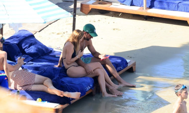 *EXCLUSIVE* Serbian tennis player Novak Djokovic and his Wife Jelena Pack on the PDA during a Family Beach Day at Nammos Beach in Mykonos.