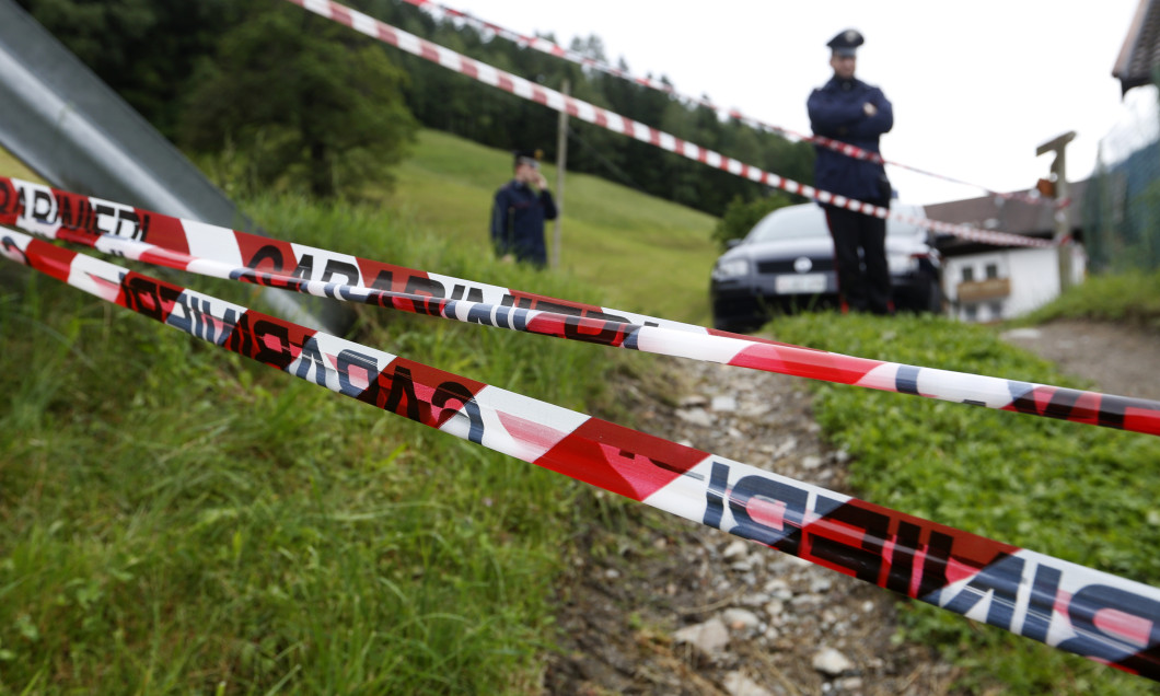 Police officers block the site where a car accident occurred, in St. Martin, northern Italy