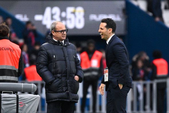 Luis Campos ( manager PSG ) talks with Diego J Lopez ( manager Lens ) during the Ligue 1 match between Paris Saint Germa