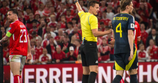 Copenhagen, Denmark. 05th Sep, 2025. Pierre-Emile Højbjerg #23 of Denmark receives a yellow card from Referee Daniel Siebert during the FIFA World Cup 2026 qualifier match between Denmark and Scotland at Parken Stadium. Final score: Denmark 0 :0 Scotland.