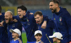 Federico Dimarco, Alessandro Bastoni, Nicolo Barella and Gianluigi Donnarumma of Italy sing the national anthem during the FIFA 2026 european Qualifier football match between Italy and Norway at San Siro stadium in Milano (Italy), November 16, 2025.