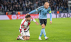 Andrei Ratiu on the pitch and Vladimir Weiss jr. on foot during Europa Conference league match , SK Slovan Bratislava -
