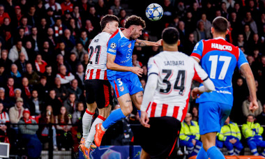 Dennis Man of PSV Eindhoven and Matteo Ruggeri of Atletico Madrid compete for the headed ball during the UEFA Champions League 2025/26 League Phase MD6 match between PSV Eindhoven and Atletico de Madrid at PSV Stadion on December 9, 2025 in Eindhoven, Net