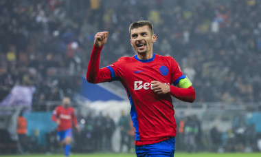 10 Florin Tanase celebrates scoring his first goal of the matchand winning the match