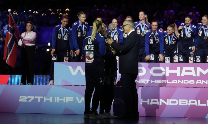 Rotterdam, Netherlands 20251214. Vice President of the International Handball Federation Joel Delplanque presents the World Championship trophy to Norway's goalkeeper Katrine Lunde and Henny Ella Reistad after the final of the Women's World Championship b