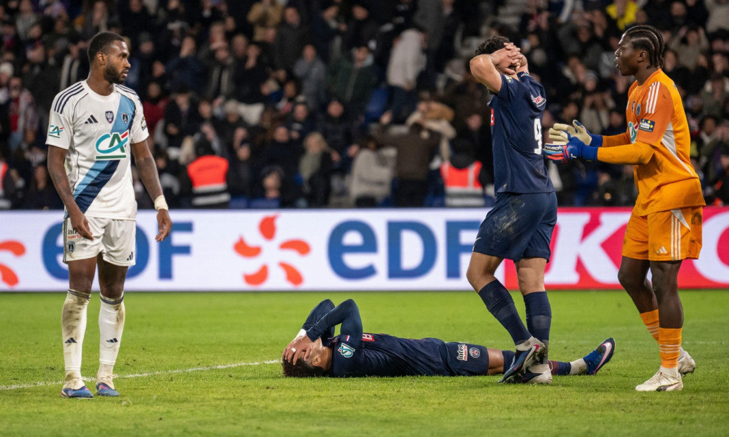 Paris, France. 13th Jan, 2026. Paris Saint-Germain's French midfielder #14 Desire Doue reacts on the ground after losing the French Cup round of 32 football match between Paris Saint-Germain (PSG) and Paris FC at the Parc des Princes stadium in Paris on J