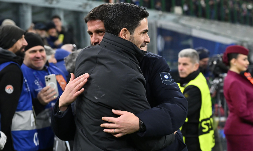 Mikel Arteta of Arsenal F.C. and Cristian Chivu coach of F.C. Inter participates in the UEFA Champions League phase day 7 football match between F.C. Inter and Arsenal F.C. at the San Siro Stadium on January 20, 2026 in Milan, Italy.