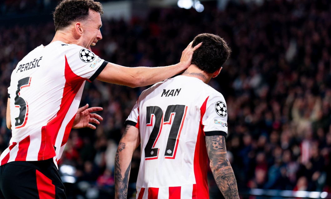 Eindhoven, Netherlands. 21st Oct, 2025. EINDHOVEN, NETHERLANDS - OCTOBER 21: Dennis Man of PSV celebrates after scoring the team's fourth goal with Ivan Perisic of PSV during the UEFA Champions League 2025/26 League Phase MD3 match between PSV and SSC Nap