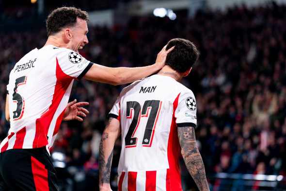 Eindhoven, Netherlands. 21st Oct, 2025. EINDHOVEN, NETHERLANDS - OCTOBER 21: Dennis Man of PSV celebrates after scoring the team's fourth goal with Ivan Perisic of PSV during the UEFA Champions League 2025/26 League Phase MD3 match between PSV and SSC Nap