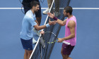 Carlos Alcaraz of Spain (R) greets at the net Novak Djokovic of Serbia after his semifinal victory on day 13 of the 2025 US Open Tennis Championships, Grand Slam tennis tournament on September 5, 2025 at USTA Billie Jean King National Tennis Center in Flu