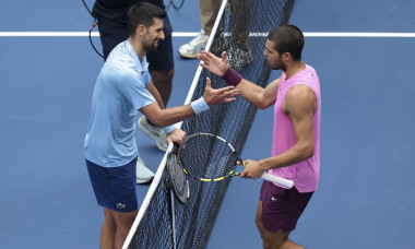 Carlos Alcaraz of Spain (R) greets at the net Novak Djokovic of Serbia after his semifinal victory on day 13 of the 2025 US Open Tennis Championships, Grand Slam tennis tournament on September 5, 2025 at USTA Billie Jean King National Tennis Center in Flu