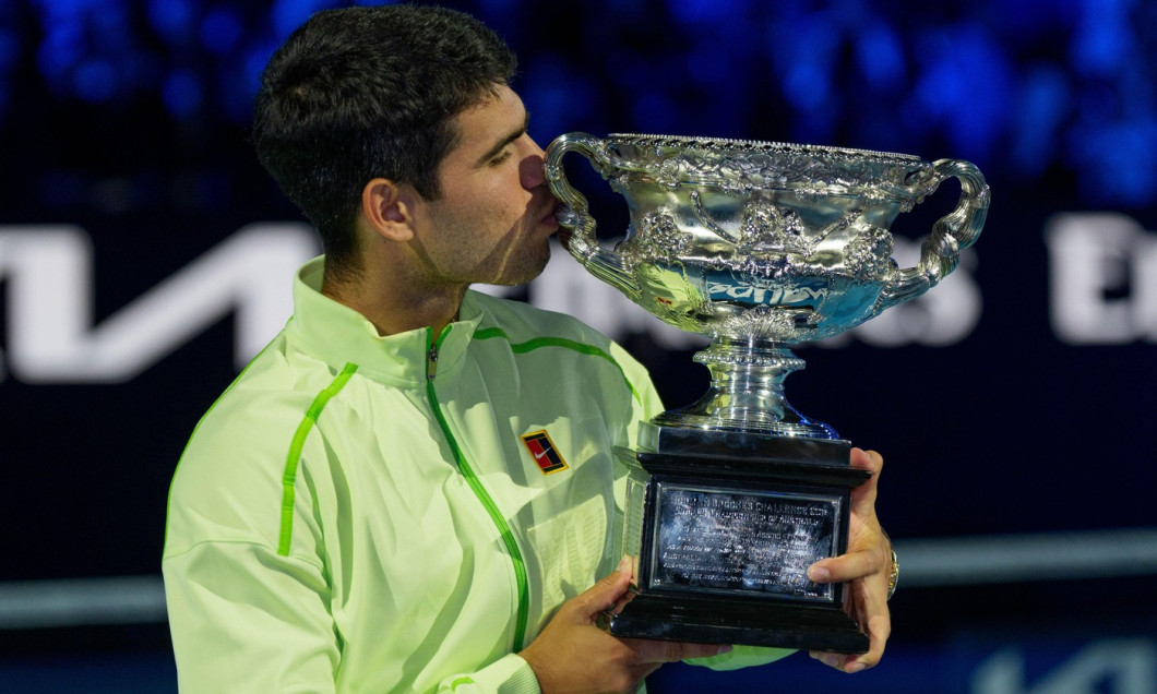 Melbourne, Australia. 1st Feb, 2026. 1st seed CARLOS ALCARAZ of Spain with the The Norman Brookes Challenge Cup after defeating 4th seed NOVAK DJOKOVIC of Serbia on Rod Laver Arena in the Men's Singles Final match on day 15 of the 2026 Australian Open in