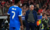 Lisbon, Portugal. 17th Feb, 2026. Vinicius Junior of Real Madrid CF (L) and Jose Mourinho, SL Benfica Coach, (R) in action during UEFA Champions League 2025/26 KO play-offs 1st leg between SL Benfica and Real Madrid CF at Estadio da Luz in Lisbon, Portuga