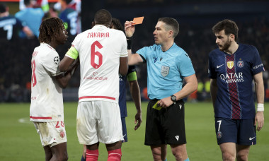 Mamadou Coulibaly of Monaco (left) receives a red card from referee Istvan Kovacs of Romania during the UEFA Champions League Knockout Play-offs Second leg football match between Paris Saint-Germain (PSG) and AS Monaco (ASM) on February 25, 2026 at Parc d