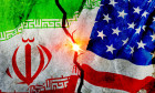 Conflict between Iran and USA represented by cracked flags on a wall