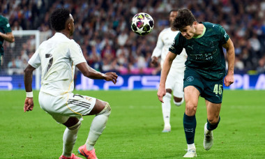 Madrid, Spain. 11th Mar, 2026. Abdukodir Khusanov of Manchester City FC battles for the ball with Vinicius Junior of Real Madrid CF during the UEFA Champions League match between Real Madrid CF and Manchester City at Bernabeu Stadium on March 11, 2026. -