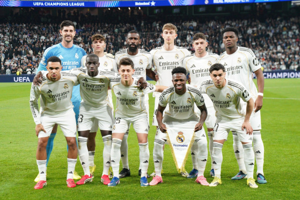 MADRID, SPAIN - MARCH 11: Thibaut Courtois, Trent Alexander-Arnold, Antonio Rudiger, Dean Huijsen, Ferland Mendy, Federico Valverde, Arda Guler, Aurelien Tchouameni, Thiago Pitarch, Brahim Diaz, and Vinicius Junior of Real Madrid pose for the team picture