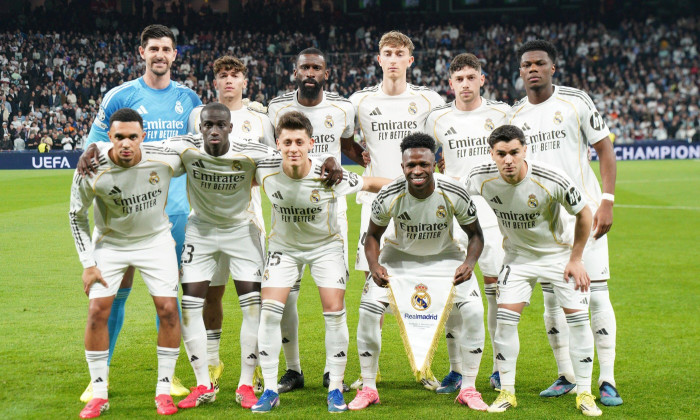 MADRID, SPAIN - MARCH 11: Thibaut Courtois, Trent Alexander-Arnold, Antonio Rudiger, Dean Huijsen, Ferland Mendy, Federico Valverde, Arda Guler, Aurelien Tchouameni, Thiago Pitarch, Brahim Diaz, and Vinicius Junior of Real Madrid pose for the team picture