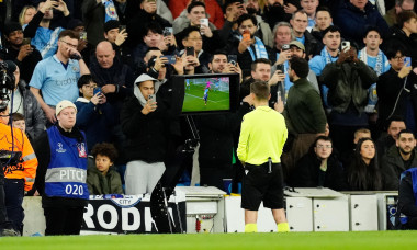 Referee Clement Turpin is sent to the VAR monitor before awarding a penalty to Real Madrid and showing a red card to Manchester City's Bernardo Silva during the UEFA Champions League match at the Etihad Stadium, Manchester. Picture date: Tuesday March 17,