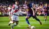 Barcelona, Espagne. 22nd Mar, 2026. Andrei RATIU of Rayo Vallecano and Raphael DIAS BELLOLI (Raphinha) of Barcelona during the Spanish championship LaLiga football match between FC Barcelona and Rayo Vallecano on 22 March 2026 at Camp Nou stadium in Barce