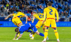 Bratislava, Slovakia, 31. March 2026. Pictured left to right Tomas Suslov of Slovakia and Vlad Dragomir during FIFA World Cup 2026 friendly Slovakia versus Romania. Credit: Dominika Kortvelyesiova/Alamy Live News