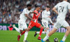 Michael Olise of Bayern Munich and Aurelien Tchouameni, Federico Valverde of Real Madrid during the UEFA Champions League, Quarter-finals, 1st leg football match between Real Madrid CF and FC Bayern Munich on 7 April 2026 at Santiago Bernabeu stadium in M