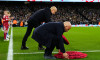 Liverpool manager Arne Slot (left) and Manchester City manager Pep Guardiola carrying poppy wreath for Remembrance Sunday ahead of the Premier League match at Etihad Stadium, Manchester. Picture date: Sunday November 9, 2025.