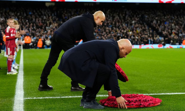 Liverpool manager Arne Slot (left) and Manchester City manager Pep Guardiola carrying poppy wreath for Remembrance Sunday ahead of the Premier League match at Etihad Stadium, Manchester. Picture date: Sunday November 9, 2025.