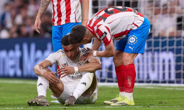 Madrid, Spain. 10th Apr, 2026. Kylian Mbappe (L) of Real Madrid CF lies injured on the pitch with Alex Moreno (R) of Girona FC during the LaLiga EA Sports 2025/2026 week 31 football match between Real Madrid CF and Girona FC at Santiago Bernabeu stadium.