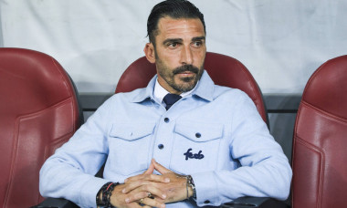 Coach Elias Charalambous on the bench before the start of the game