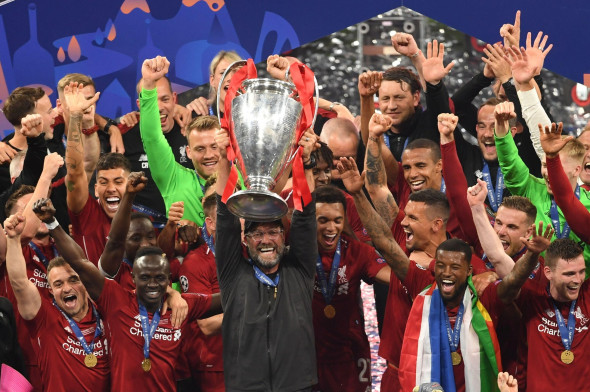 File photo dated 01/06/19 of Liverpool manager Jurgen Klopp lifting the UEFA Champions League Trophy. Both teams have endured difficulties off the pitch, and while the bond between club and fans remained solid on the red half of Merseyside ??? significant