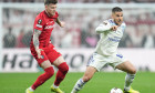 ISTANBUL, TURKEY - MAY 20: Lukas Kübler of SC Freiburg battles for the ball with Emiliano Buendía of Aston Villa during the UEFA Europa League Final 2026 match between SC Freiburg and Aston Villa FC at Besiktas Park on May 20, 2026 in Istanbul, Turkey. (P