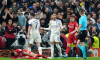 Aston Villa's Matty Cash (centre) is shown a yellow card by referee Francois Letexier (right) for a foul on Freiburg's Vincenzo Grifo during the UEFA Europa League final at Besiktas Park, Istanbul. Picture date: Wednesday May 20, 2026.