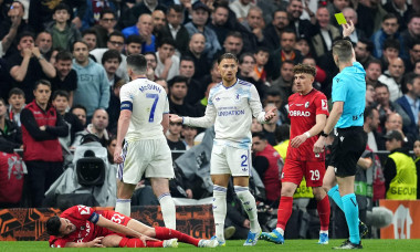 Aston Villa's Matty Cash (centre) is shown a yellow card by referee Francois Letexier (right) for a foul on Freiburg's Vincenzo Grifo during the UEFA Europa League final at Besiktas Park, Istanbul. Picture date: Wednesday May 20, 2026.