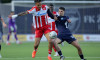 Pancevo, Serbia. 22nd April, 2026. Crvena Zvezda's Jay Ifeanyi-Junior Enem and Zeleznicar's Stefan Pirgic (R) during Serbian Superleague football match between Zeleznicar and Crvena Zvezda (Red Star) on April 22. 2026. in Pancevo, Serbia. (photo by Pedja