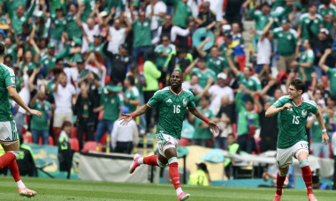 MEXICO CITY, MEXICO - JUNE 11: Julian Quinones 16 of Team Mexico celebrates scoring with teammates during the group A ma