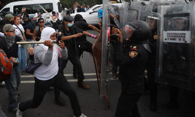 Demonstrators clash with police during the World Cup opener in Mexico City