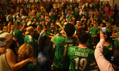 Soccer fans celebrate Mexico's World Cup victory with live brass music at Plaza Lerdo, Xalapa.