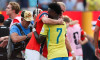 EAST RUTHERFORD, NEW JERSEY - JULY 05: Erling Haaland of Norway embraces Vinicius Junior of Brazil after the FIFA World