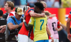 EAST RUTHERFORD, NEW JERSEY - JULY 05: Erling Haaland of Norway embraces Vinicius Junior of Brazil after the FIFA World