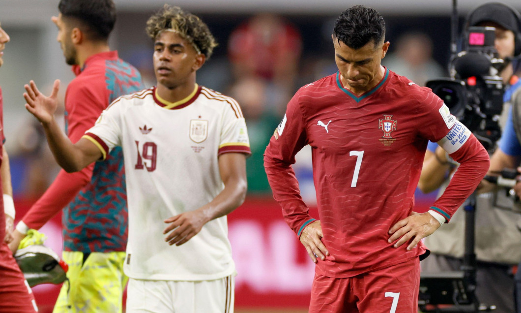 Lamine Yamal of Spain celebrates while Cristiano Ronaldo of Portugal looks dejected after the FIFA World Cup 2026 Round Of 16 match between Portugal and Spain at Dallas Stadium on July 6, 2026 in Arlington, United States.
